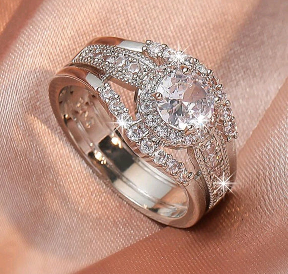 large cubic zirconia center with halo ring