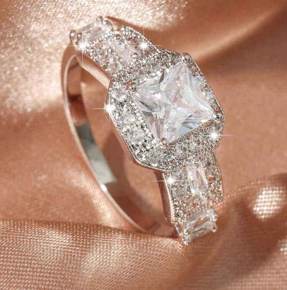 square cubic zirconia center with halo ring