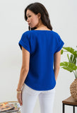 solid mock button front woven top