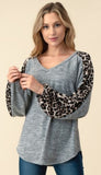 grey long sleeve with snow leopard sleeve