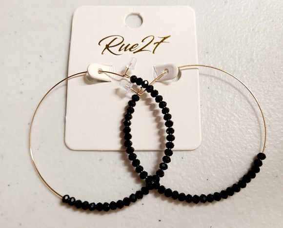 gold with black bead earring