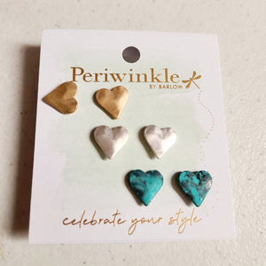 gold, silver, and patina heart earring