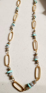 xtra long gold chain and blue stone necklace