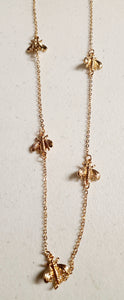 long gold bee necklace