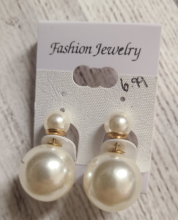 white pearl earring