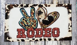 peace, love, rodeo magnet