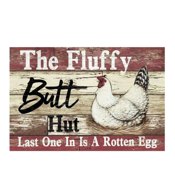 the fluffy butt hut sign