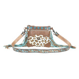 Electric embrace hand tooled bag